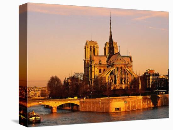 Morning Light on Notre Dame, Paris, France-Walter Bibikow-Stretched Canvas