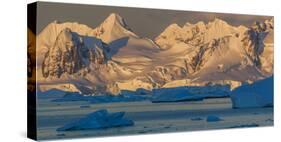 Morning light shines on the mountains and Icebergs, Antarctica-Art Wolfe-Stretched Canvas