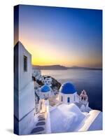 Morning sunlight on the blue houses of Oia, Santorini, Greece-Jan Christopher Becke-Stretched Canvas