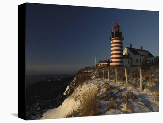 Morning Sunlight Strikes the West Quoddy Head Lighthouse, Lubec, Maine-Michael C. York-Stretched Canvas
