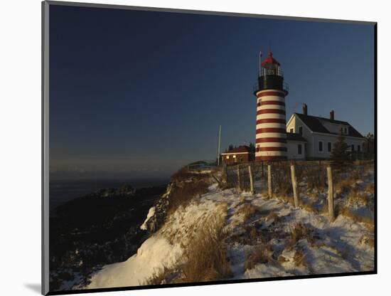 Morning Sunlight Strikes the West Quoddy Head Lighthouse, Lubec, Maine-Michael C. York-Mounted Photographic Print