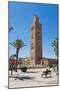 Moroccan Man Sat on a Bench in Front of Koutoubia Mosque, Marrakech, Morocco, North Africa, Africa-Matthew Williams-Ellis-Mounted Photographic Print