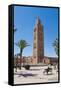 Moroccan Man Sat on a Bench in Front of Koutoubia Mosque, Marrakech, Morocco, North Africa, Africa-Matthew Williams-Ellis-Framed Stretched Canvas