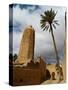 Moroccan Man, Stone Minaret of Sawmann Al-Hajaria, Figuig, Province of Figuig, Morocco-Emanuele Ciccomartino-Stretched Canvas