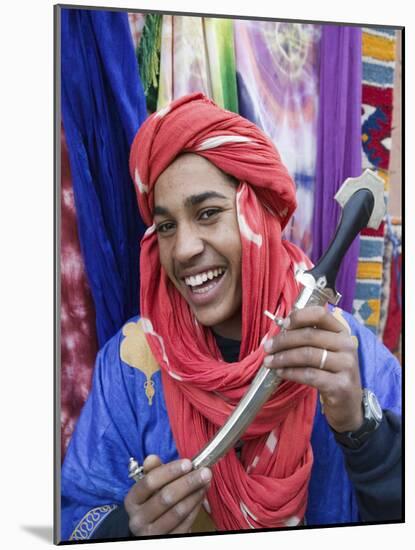 Moroccan Souvenir Seller, Ait Benhaddou, South of the High Atlas, Morocco-Walter Bibikow-Mounted Photographic Print