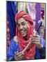 Moroccan Souvenir Seller, Ait Benhaddou, South of the High Atlas, Morocco-Walter Bibikow-Mounted Photographic Print