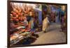 Morocco. An elderly man walks past tourist shops along a street in the blue city of Chefchaouen.-Brenda Tharp-Framed Photographic Print