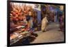 Morocco. An elderly man walks past tourist shops along a street in the blue city of Chefchaouen.-Brenda Tharp-Framed Photographic Print