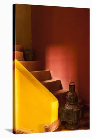 Morocco. An old lantern and jug on steps of a restored Kasbah with a texture overlay.-Brenda Tharp-Stretched Canvas