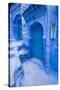 Morocco, Chaouen. Bright Blue House Exteriors in a Narrow Street-Emily Wilson-Stretched Canvas