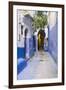 Morocco, Chaouen. Narrow Street Lined with Blue Buildings-Emily Wilson-Framed Premium Photographic Print