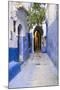 Morocco, Chaouen. Narrow Street Lined with Blue Buildings-Emily Wilson-Mounted Premium Photographic Print