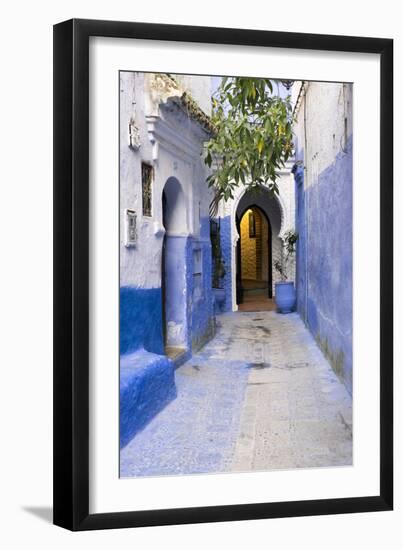 Morocco, Chaouen. Narrow Street Lined with Blue Buildings-Emily Wilson-Framed Premium Photographic Print