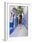 Morocco, Chaouen. Narrow Street Lined with Blue Buildings-Emily Wilson-Framed Premium Photographic Print