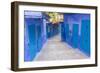 Morocco, Chaouen. Narrow Street Lined with Blue Buildings-Emily Wilson-Framed Photographic Print