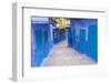 Morocco, Chaouen. Narrow Street Lined with Blue Buildings-Emily Wilson-Framed Photographic Print