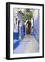 Morocco, Chaouen. Narrow Street Lined with Blue Buildings-Emily Wilson-Framed Photographic Print