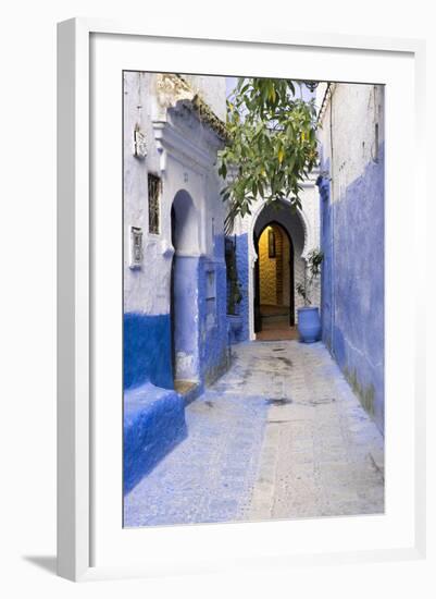 Morocco, Chaouen. Narrow Street Lined with Blue Buildings-Emily Wilson-Framed Photographic Print