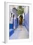 Morocco, Chaouen. Narrow Street Lined with Blue Buildings-Emily Wilson-Framed Photographic Print