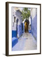 Morocco, Chaouen. Narrow Street Lined with Blue Buildings-Emily Wilson-Framed Photographic Print