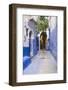 Morocco, Chaouen. Narrow Street Lined with Blue Buildings-Emily Wilson-Framed Photographic Print