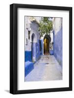 Morocco, Chaouen. Narrow Street Lined with Blue Buildings-Emily Wilson-Framed Photographic Print