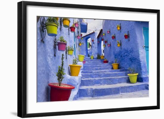 Morocco, Chaouen. Plantings in Colorful Pots Line the Narrow Corridors-Emily Wilson-Framed Photographic Print