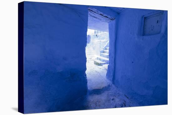 Morocco, Chaouen. Vivid Blue Doorway Out to the Street-Emily Wilson-Stretched Canvas