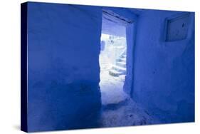 Morocco, Chaouen. Vivid Blue Doorway Out to the Street-Emily Wilson-Stretched Canvas