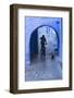 Morocco, Chefchaouen. Bicyclist Rides Past Cat in Archway in the Blue Village of Chefchaouen-Brenda Tharp-Framed Photographic Print