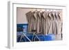 Morocco, Essaouira, Djellabas Hanging on Wall Next to Bicycle-Emily Wilson-Framed Photographic Print