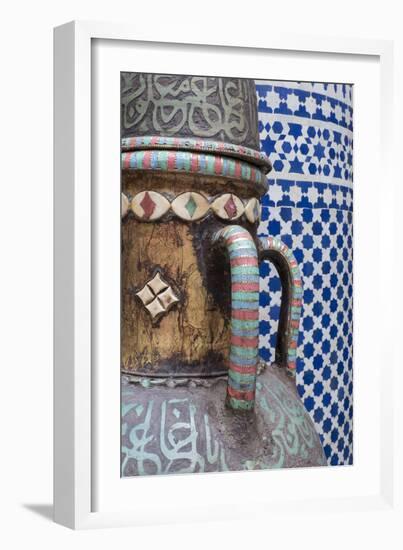 Morocco, Fes. Vase and pillar details with traditional design in the interior of a riad.-Brenda Tharp-Framed Photographic Print