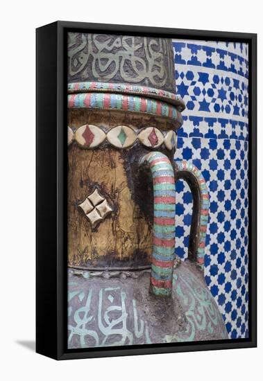 Morocco, Fes. Vase and pillar details with traditional design in the interior of a riad.-Brenda Tharp-Framed Stretched Canvas