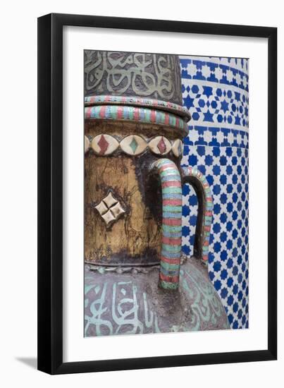 Morocco, Fes. Vase and pillar details with traditional design in the interior of a riad.-Brenda Tharp-Framed Premium Photographic Print