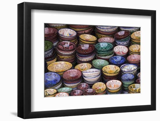 Morocco, Marrakech. Colorfully painted ceramic bowls for sale in a souk, a shop.-Brenda Tharp-Framed Photographic Print