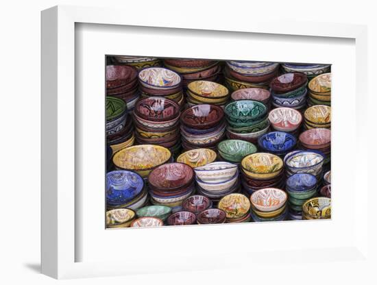 Morocco, Marrakech. Colorfully painted ceramic bowls for sale in a souk, a shop.-Brenda Tharp-Framed Photographic Print