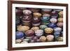 Morocco, Marrakech. Colorfully painted ceramic bowls for sale in a souk, a shop.-Brenda Tharp-Framed Photographic Print