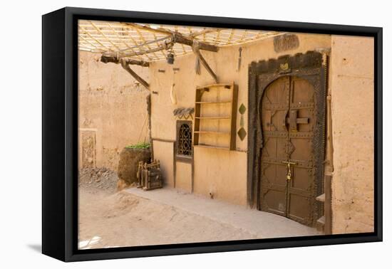 Morocco, South of Morocco, Traditionally Carved Wood Door at Tamnougalt Kasbah in the Draa Valley-Emily Wilson-Framed Stretched Canvas