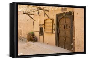 Morocco, South of Morocco, Traditionally Carved Wood Door at Tamnougalt Kasbah in the Draa Valley-Emily Wilson-Framed Stretched Canvas