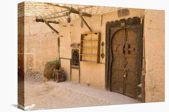 Morocco, South of Morocco, Traditionally Carved Wood Door at Tamnougalt Kasbah in the Draa Valley-Emily Wilson-Stretched Canvas