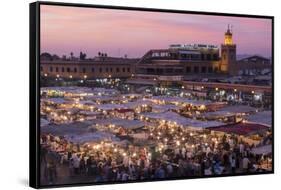 Morocco. Sunset over the famous Djemaa El-Fna square in Marrakech-Brenda Tharp-Framed Stretched Canvas