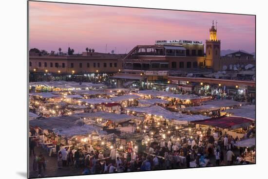 Morocco. Sunset over the famous Djemaa El-Fna square in Marrakech-Brenda Tharp-Mounted Photographic Print