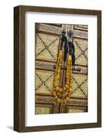 Morocco, Tinerhir. Traditional necklace of Berber woman hangs on a cabinet with camel-bone inlay-Brenda Tharp-Framed Photographic Print