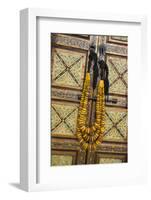 Morocco, Tinerhir. Traditional necklace of Berber woman hangs on a cabinet with camel-bone inlay-Brenda Tharp-Framed Photographic Print