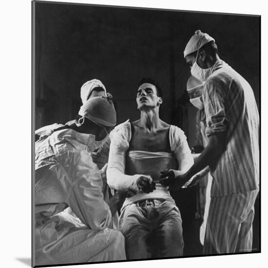 Mortar Wounded Army Medic Private George Lott, Sitting Up While 4 Army Surgeons Finish Up His Cast-Ralph Morse-Mounted Photographic Print