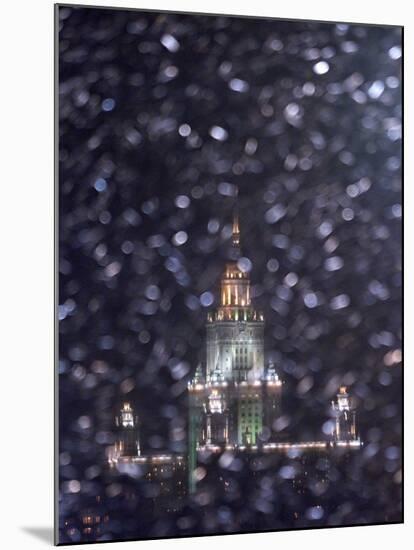 Moscow State University is Illuminated During a Rare Snow Fall This Winter Season-null-Mounted Premium Photographic Print