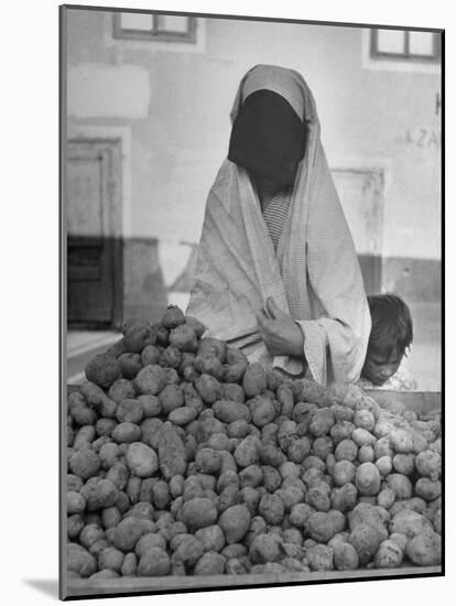 Moslem Woman Shopping for Potatoes-John Phillips-Mounted Photographic Print