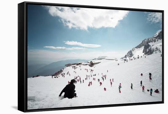 Mostly Local Tourists Playing in the Snow on Top of Jade Dragon Snow Mountain Near Lijiang-Andreas Brandl-Framed Stretched Canvas