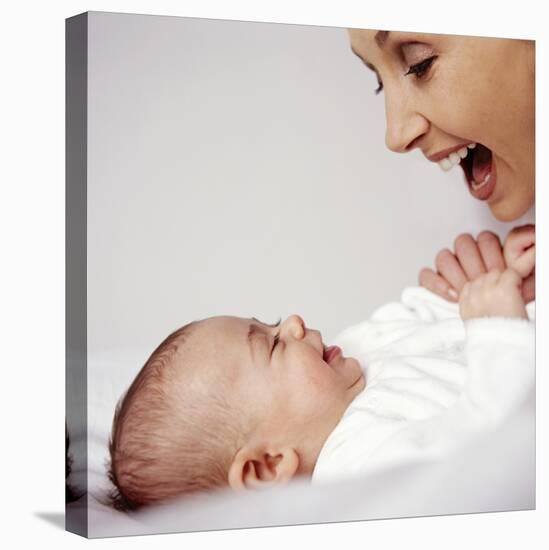 Mother And Baby Girl-Ian Boddy-Stretched Canvas