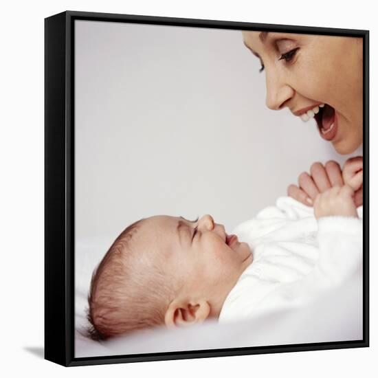 Mother And Baby Girl-Ian Boddy-Framed Stretched Canvas